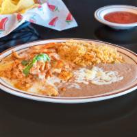 Pollo al Queso · Grilled chicken strips topped with melted cheese. Served with rice and choice of charro, bla...