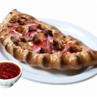 Small Meat Lover Calzone · With homemade tomato sauce, mozzarella cheese, ricotta cheese, pepperoni, salami, Canadian b...