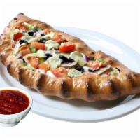 Small Veggie Calzone · With homemade tomato sauce, mozzarella cheese, ricotta cheese, mushroom, red onions, green b...