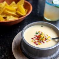 Queso Blanco · Roasted corn, poblanos, jalapenos and red bell pepper.
