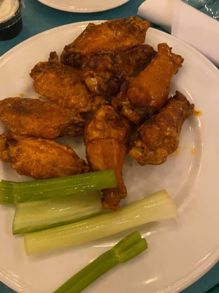 8 Jumbo Fresh Wings · Naked or breaded, served with creamy gorgonzola, celery sticks and your choice of wing sauce. Hot, mild, Asian BBQ, honey garlic, sweet Thai chili, and WV style (ranch/mild combo).
