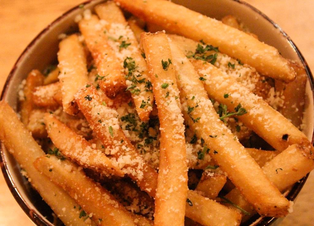 Truffle Fries  · Parmesan cheese, and truffle oil.