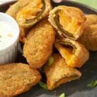 Jalapeno Poppers · Jalapeno Popper filled with cheddar and breaded with bread crumbs