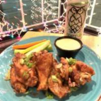 Jumbo Chicken Wings · Large and plump pieces. Served with celery and rainbow carrots.