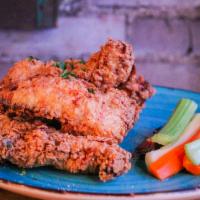 Housemade Fried Chicken Tenders · 5 pieces of our hand breaded chicken tenders made in house, not frozen from a box, served wi...