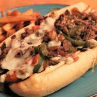 Philly Steak Bomb with side · Shaved steak, peppers, onion, mushrooms and provolone cheese. Served with a choice of side.