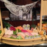 Love Boat for 2 · Our chef's 16 pieces sashimi, 8 pieces of sushi, one incurable roll and one California roll.