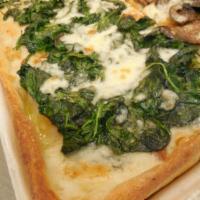Spinach Pan Pizza · Baby spinach sauteed in garlic and olive oil.