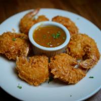 Coconut Shrimp · 6 shrimp, beer battered, tossed in coconut flakes and fried. Served with our apricot dipping...