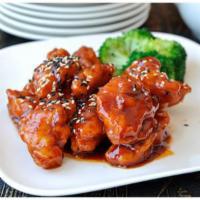 #30. Sesame Chicken · Served in a sweet sauce served with sesame seeds.