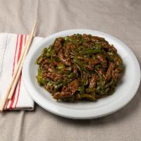 #33. Pork with Scallion · With young mild onions.