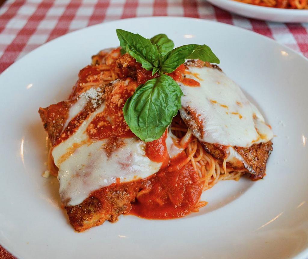 Veal Parmigiana · Grande. Veal scallopini with Squisito tomato sauce, mozzarella cheese, and capellini pasta.