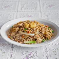 D56. Pineapple Fried Rice · Stir-fried rice with egg, pineapple, onion, tomato, peas, carrot and cashew nuts.