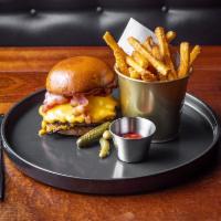 Tavern 157 Burger · Daily ground Angus beef cheeseburger, applewood smoked bacon, house sauce, brioche bun, serv...