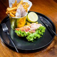 LOBSTER ROLL · Baked live lobster with lemon aioli served with truffle frites.