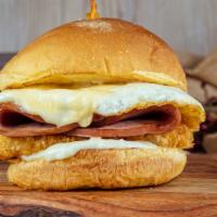 The Egg Sandwich · 2 eggs, mayo, hash brown patty, cheese with Brioche bun. Choice of: bacon, ham, sausage or G...