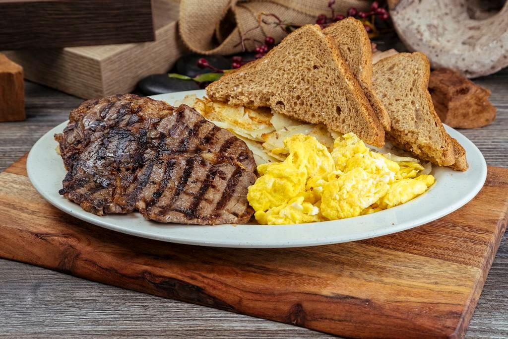 Steak & Eggs Breakfast · Comes with 3 eggs, hash browns, toast and jelly.  