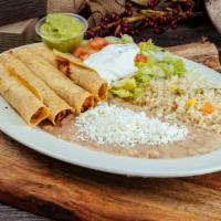 Taquito Plate · Rice, beans, lettuce, tomato, guacamole, sour cream. Choice of protein: shredded beef or chi...