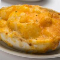 Smoked Gouda & Bacon Au Gratin Potatoes · Diced Potatoes Baked with Smoked Gouda, Bacon, and a Creamy Béchamel. Cannot be prepared wit...