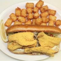 Catfish Po' Boy · It comes with our homemade tartar sauce, lettuce, tomatoes, pickles, and onions. Served with...