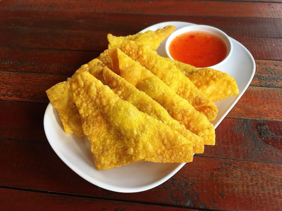 A3. Fried Wonton · 5 pieces. Fried a mixture of ground pork, garlic, potatoes, curry powder, and black pepper, wrapped in wonton skin. Served with sweet and sour sauce.
