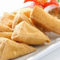 A4. Fried Tofu · 8 pieces. Fried tofu served with sweet and sour sauce, topped with crushed peanuts.