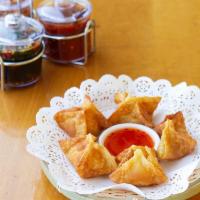 A5. Crab Rangoon · 5 pieces. Fried wontons filled with cream cheese, imitation crab, and onion. Served with swe...