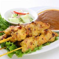 A9. Satay · 4 pieces. Chicken or tofu. Skewered marinated chicken or tofu in a mixture of Thai spices. S...