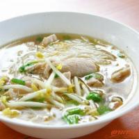 N9. Meatball Noodle Soup · Rice noodle soup with beef meatballs, bean sprouts, topped with fried garlic, cilantro, and ...