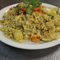 FR2. Pineapple Fried Rice · Rice stir-fried with egg, raisin, pineapple, cashew nut, and curry powder.