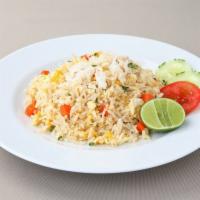 FR5. Crab Fried Rice · Rice stir-fried with egg, real crabmeat, white onion, green onion, and carrot.