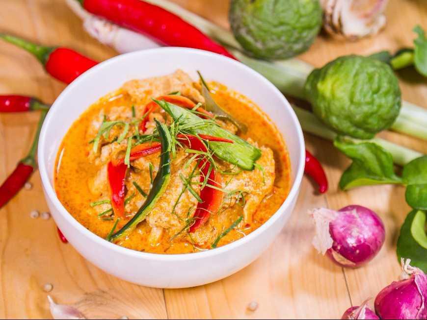 C2. Panang Curry · Panang curry with coconut milk, bell pepper, and green bean. Spicy.