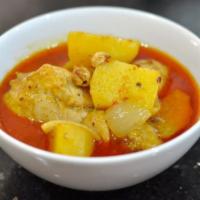 C3. Masaman Curry · Masaman curry with coconut milk, peanut, carrot, white onion, potatoes.