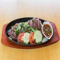 SP1. Tiger Cry · 8 oz. of grilled marinated sirloin steak with Thai Taste spicy roasted chili sauce, lettuce,...