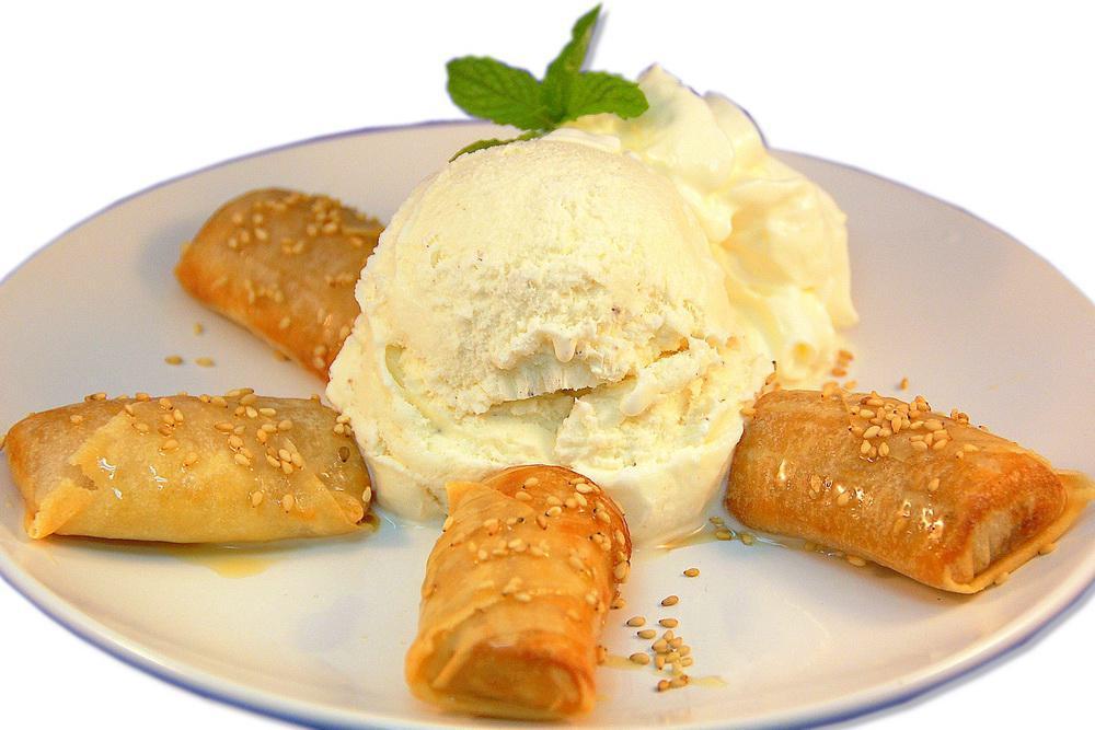 3. Fried Banana and Ice Cream · Fried banana served with ice cream and honey.