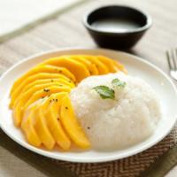 mango sticky rice  · sweet sticky rice top with mango and coconut milk. 