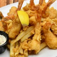 Shrimp & Chips · Hand battered butterflied shrimp, tartar sauce & fries.