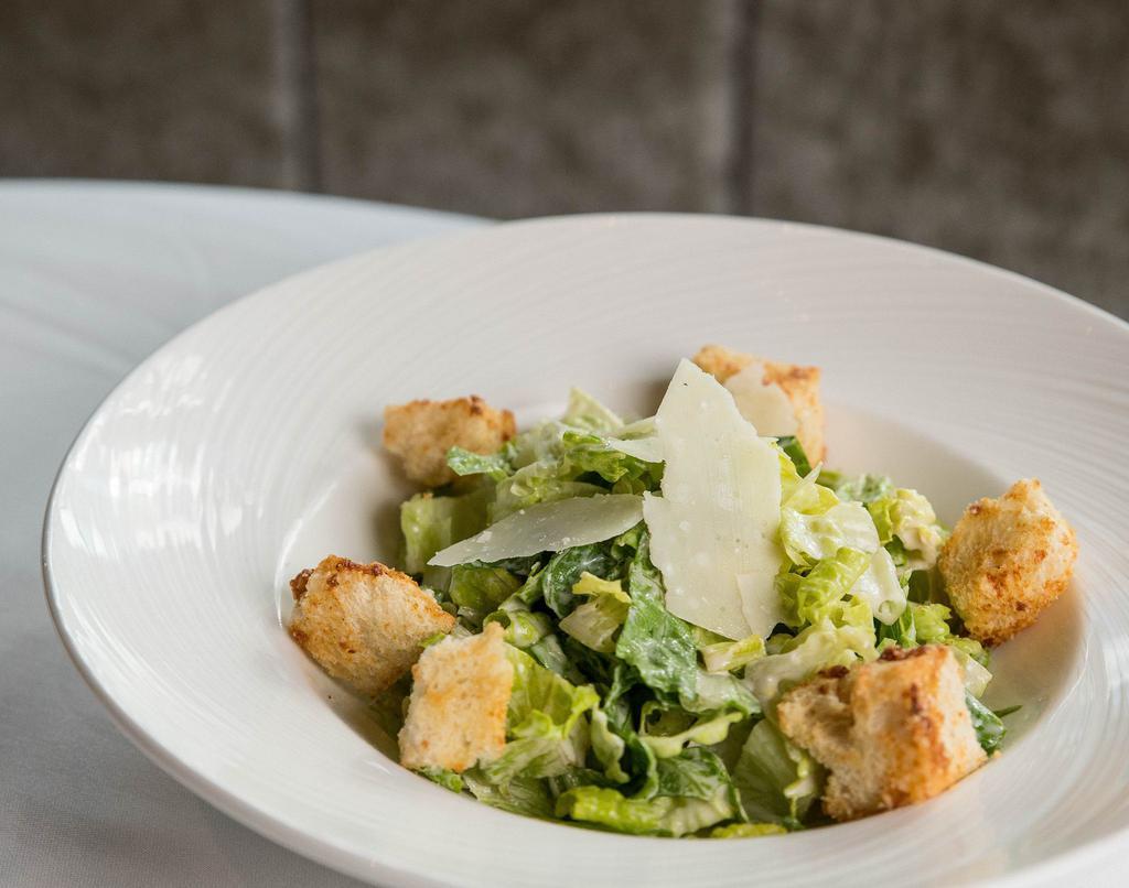 Caesar Salad · Romaine lettuce, Caesar dressing, croutons, Parmigiano cheese.