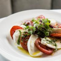 Caprese Salad · Buffalo mozzarella, tomato, basil.