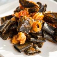 Fruti di Mare Pasta · Fettucine, mussels, squid, shrimp, and cherry tomatoes.