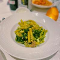 Maccaroni Pasta · Broccoli rabe, sausage and broccoli rabe pesto.