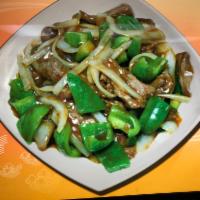 75. Pepper Steak with Onions · Stir fried steak with vegetables and a savory sauce.