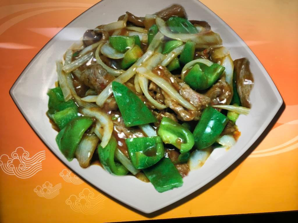 75. Pepper Steak with Onions · Stir fried steak with vegetables and a savory sauce.