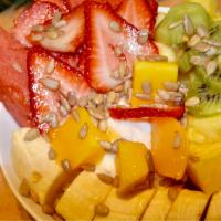 Maui Fruit Salad · Fresh strawberries, bananas, melon, papaya, mango and cottage cheese. Topped with honey and ...