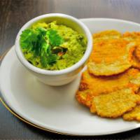 Guacamole with Chips or Fried Plantains · Pick your choice of Chips or Fried Plantains. (Tostones) A creamy dip made from avocado.
