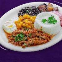 Casado  · Married. Accompanied by white rice, black beans, sweet plantains, picadillo, and a fried egg...
