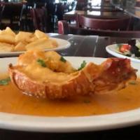 Lobster Tail in Garlic Sauce · Comes with 2 sides of your choice! 