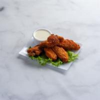 Chicken Wings · Tossed in choice of housemade Buffalo, tangy BBQ, sweet and spicy or garlic Parmesan sauce. ...