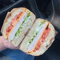 Del Amo Sandwich Lunch  · Boar's head oven roasted turkey, cheddar cheese, tomatoes, lettuce and mayo.