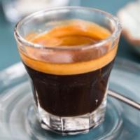 Americano · A single espresso shot over hot or iced water. 